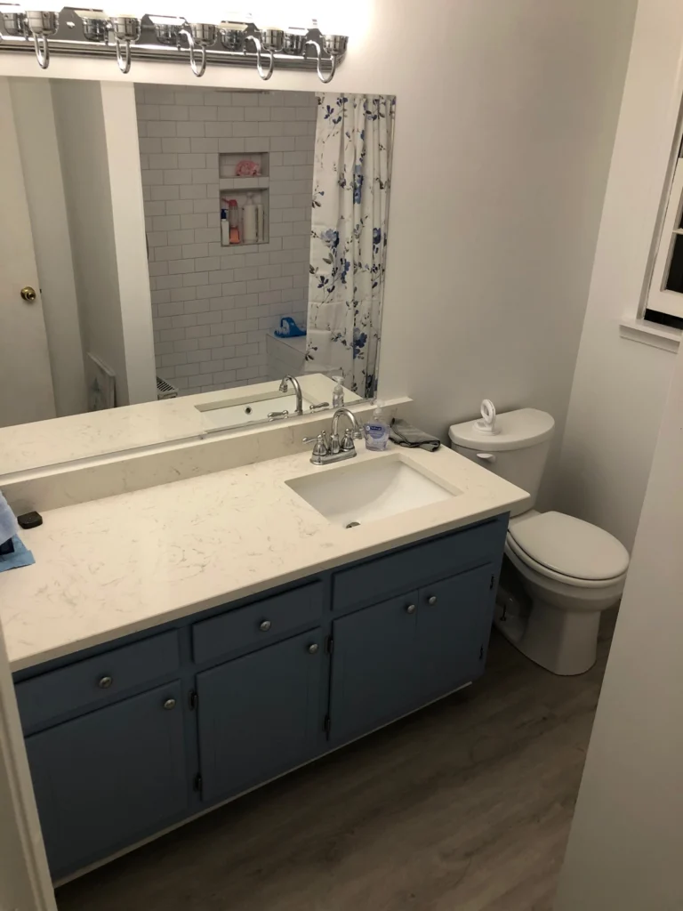 Brand new restored bathroom after a plumbing issue ruined it