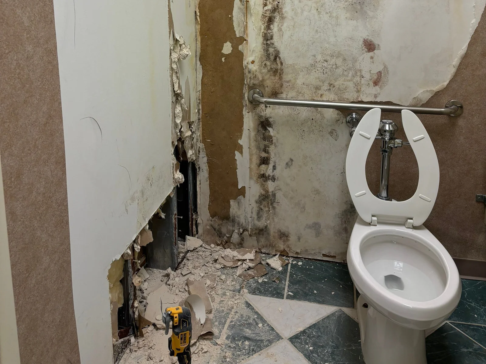 Emergency plumbing and water damage cleanup in a commercial property